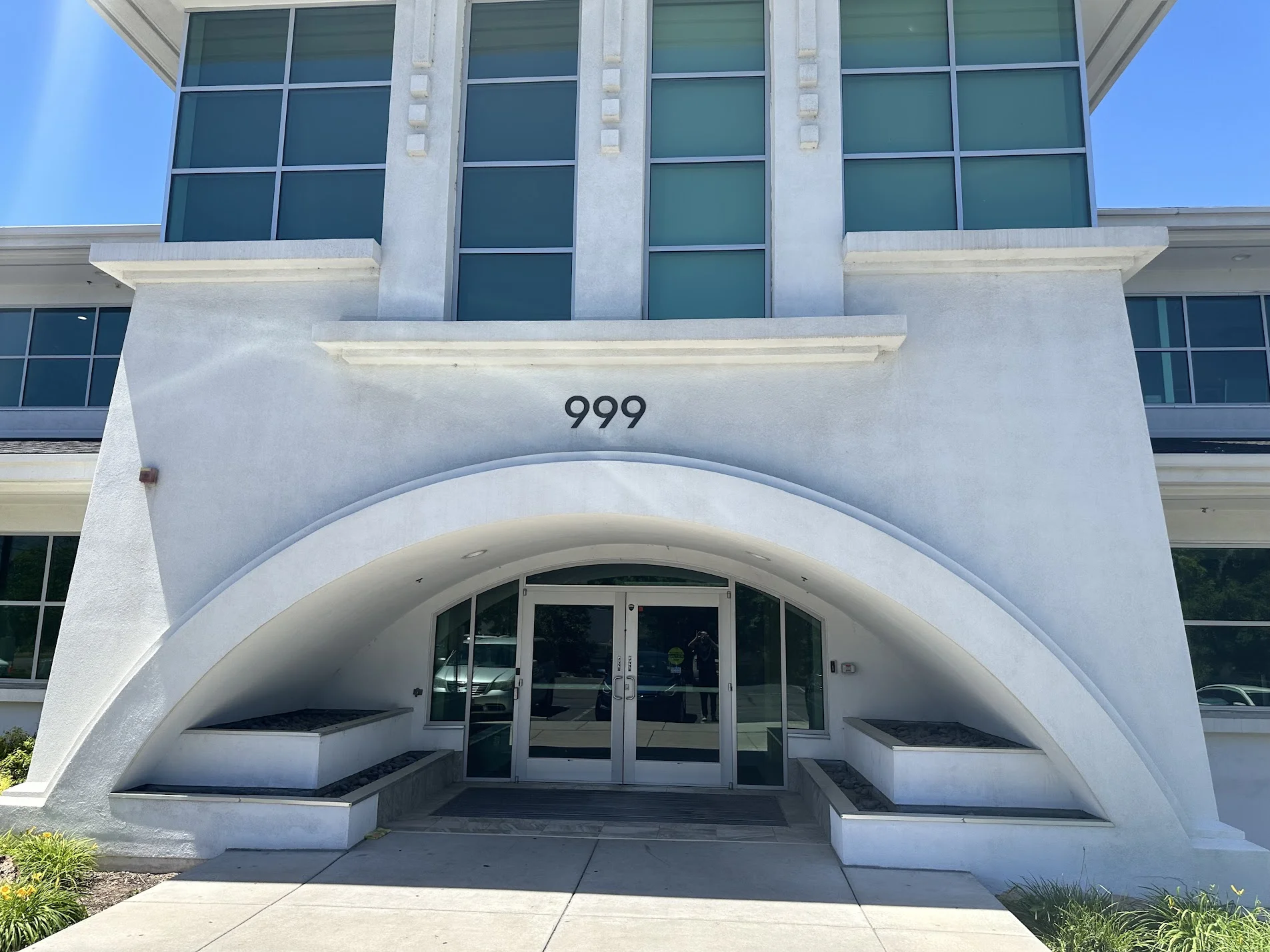 Advanced Foot and Ankle Clinic Holladay clinic, white building with large arch over doors