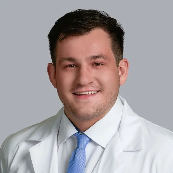 Dr. Evan Schneider