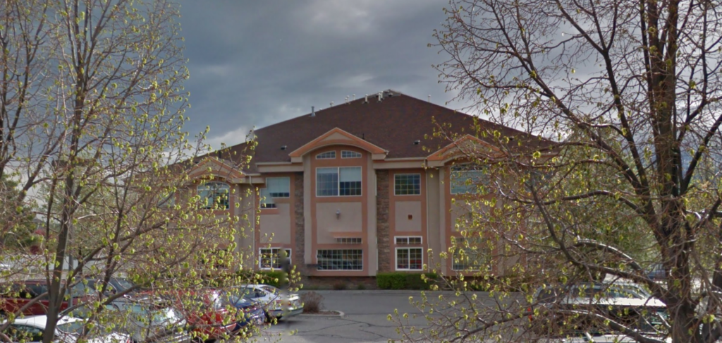 Advanced Foot and Ankle Center - West Jordan at W 7000 S, UT - red brick building with trees and parking