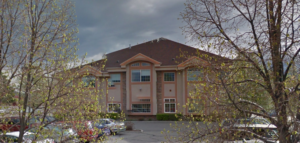 Advanced Foot and Ankle Center - West Jordan at W 7000 S, UT - red brick building with trees and parking