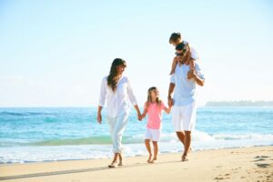 Happy Family on the Beach - Why Choose Precision Foot and Ankle Centers