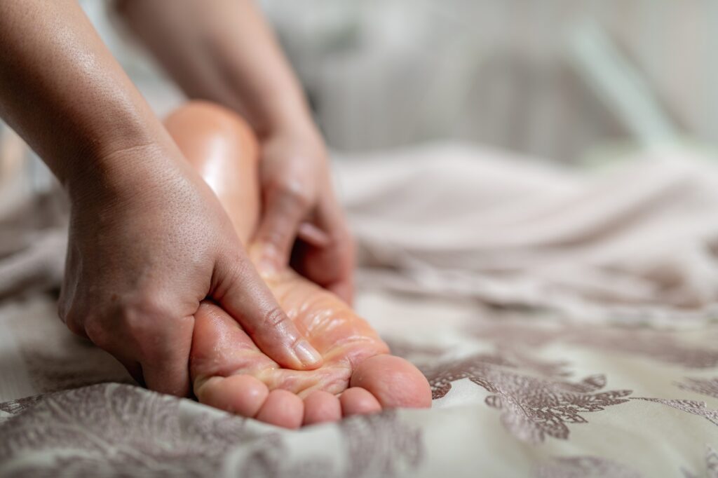 Vascular / Circulation Testing - Relaxing foot massage for a man, focusing on relieving stress, improving blood circulation