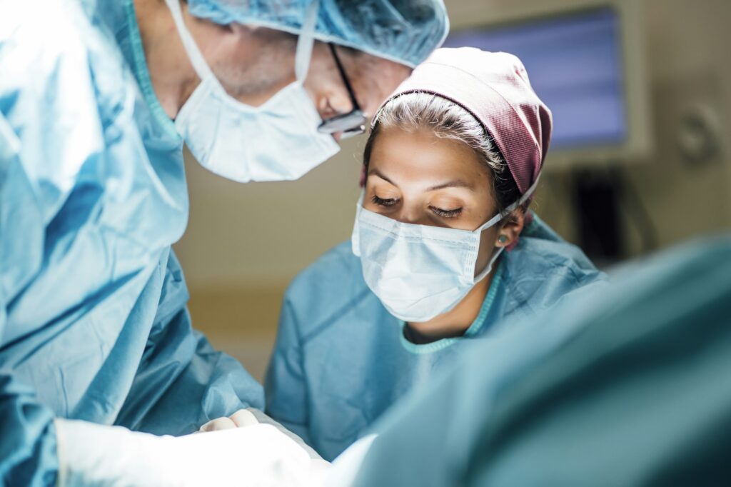 Surgeons and nurse during a foot surgery