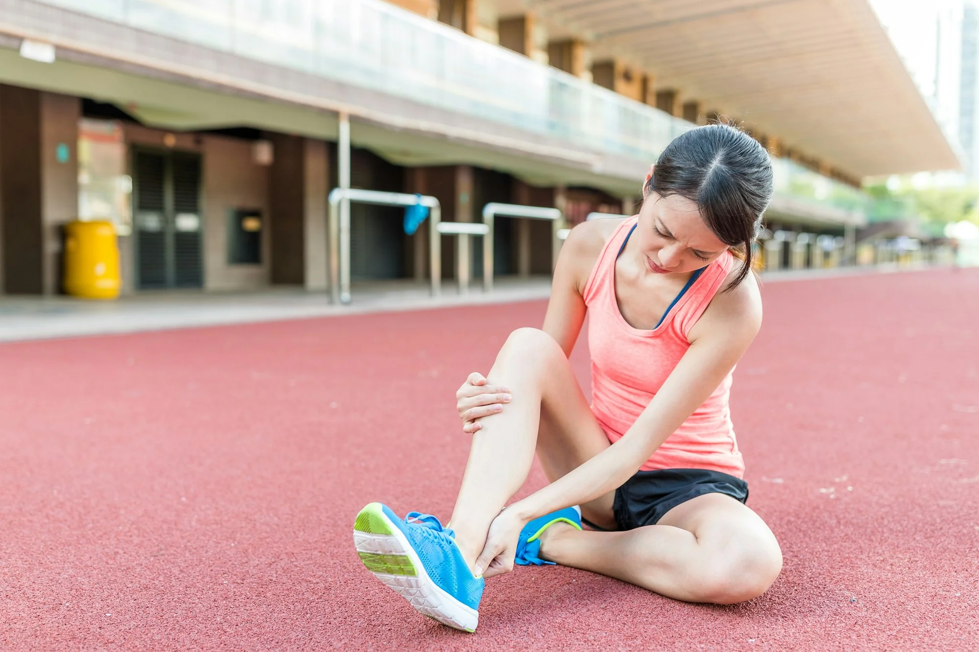 Woman having ankle sprain